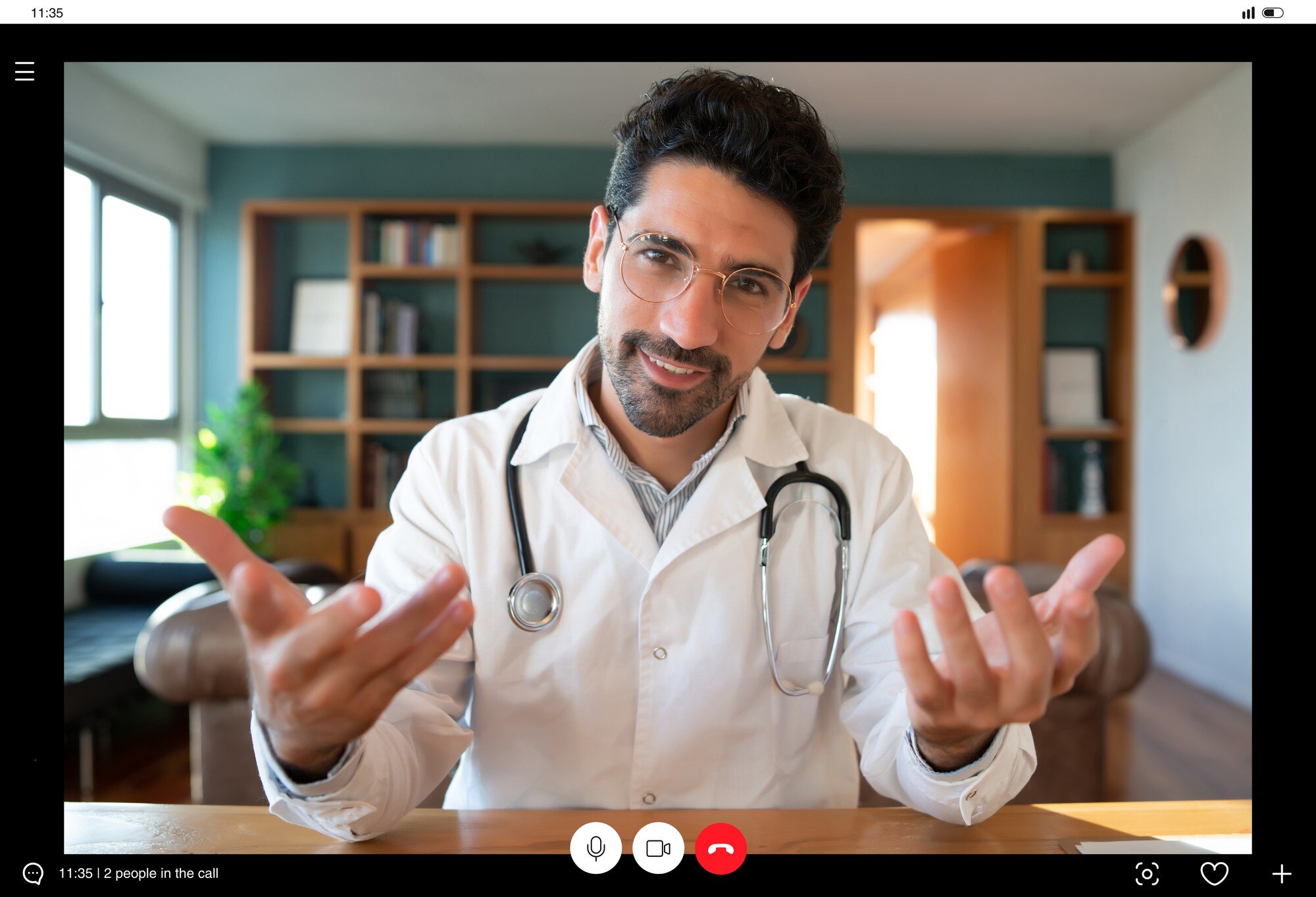portrait-doctor-video-call-virtual-appointment-with-patient